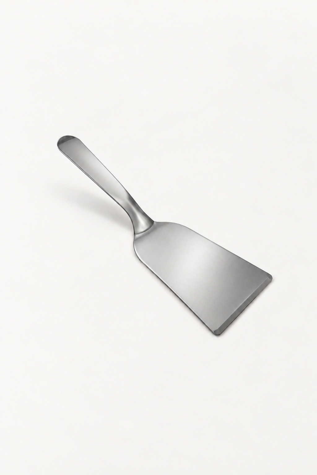 A stainless steel lasagne server with a long handle and a flat, angled server blade, shown on a clean white background.